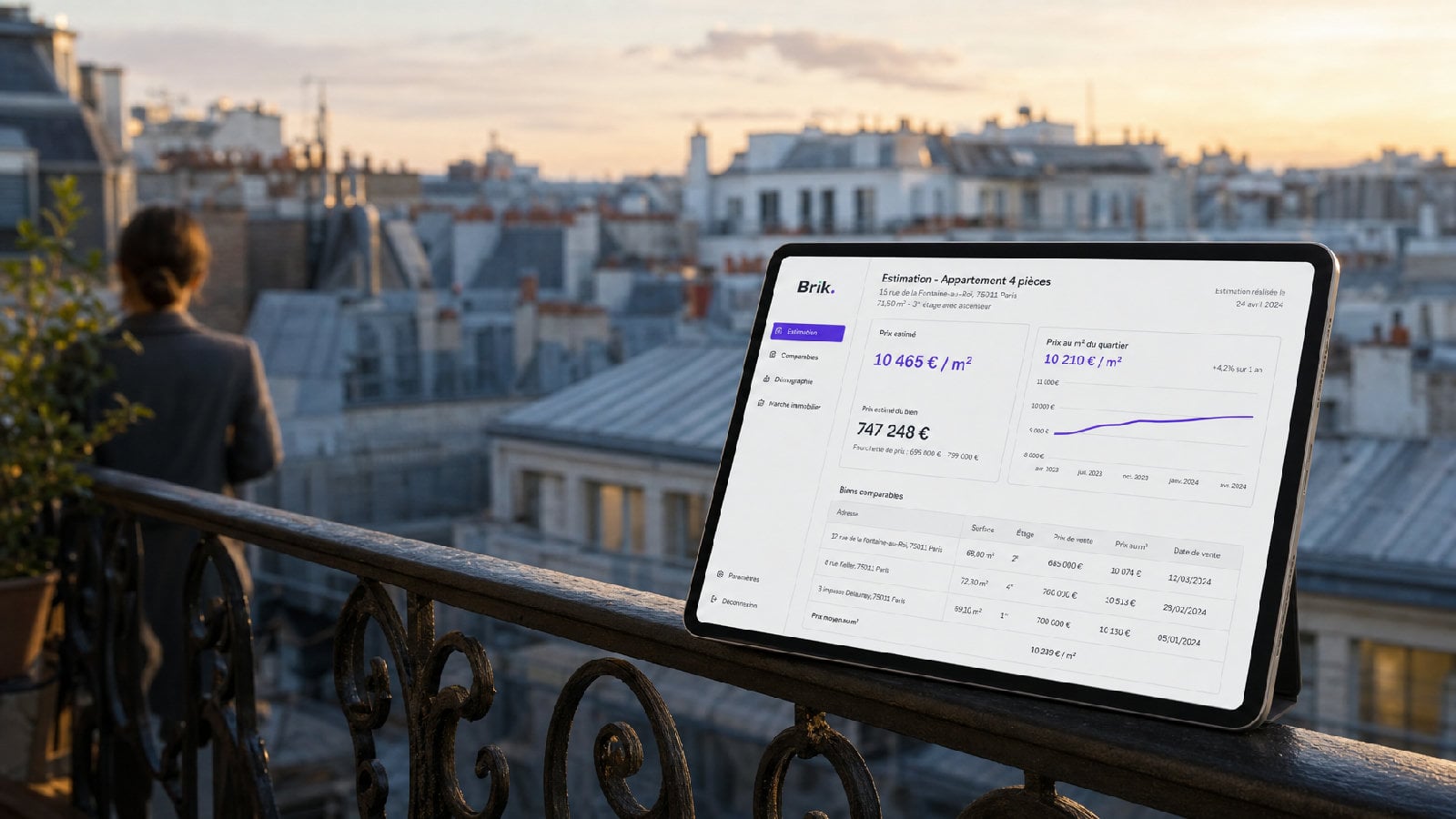 Toits de Paris au coucher du soleil, une estimation ouverte sur une tablette